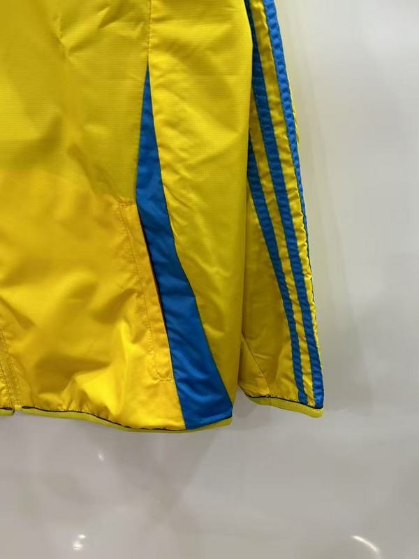 25-26 R MAD yellow and blue reversible windbreaker